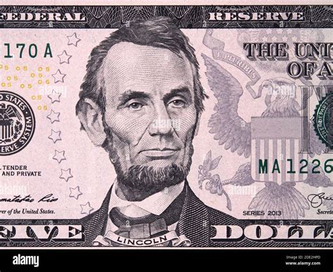 Abraham Lincoln Close Up On United States Five Dollar Bill Stock Photo