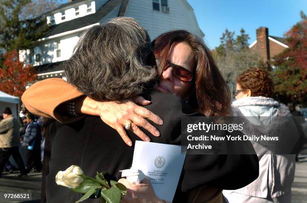 Nannette Forteza Second From Left Is Comforted By A Friend While