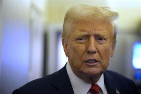 The Latest Federal Judge Temporarily Blocks Trump S Federal Funding