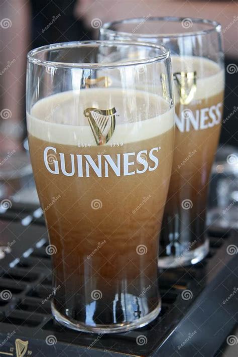Two Pints Of Beer Served At The Guinness Brewery Editorial Photo