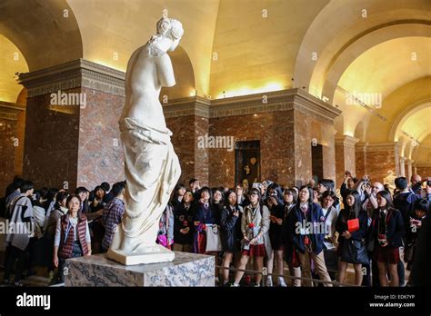 Venus De Milo Sculpture Crowd People Tourists Inside Museum Stock Photo